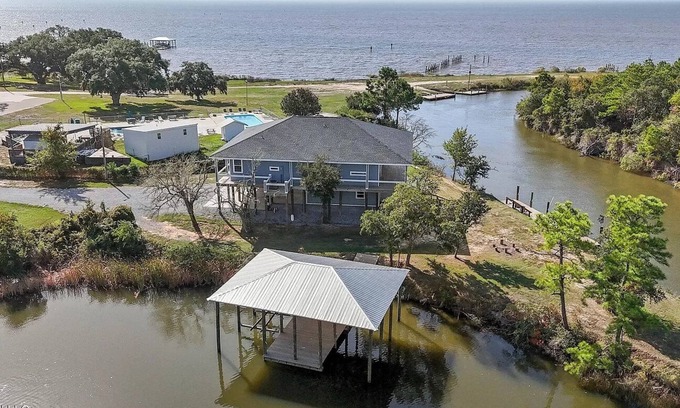 Ocean Springs Cottage | The Fin & Feather. A Gorgeous Seaside Cottage.2 docks. An incredible experience!