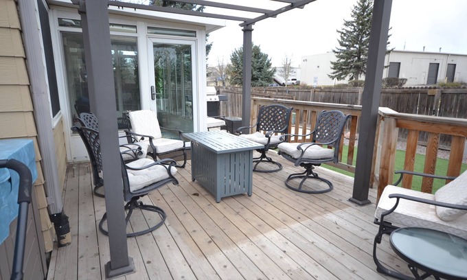 Northglenn House | The "Grandest Little Home" with Garage, 2 Decks, Sun Room, and 2 Person Hot Tub