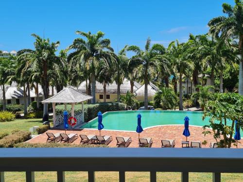 Freetown Apartment | The Hideaway 1 Bedroom Suite, Pool and Sea views