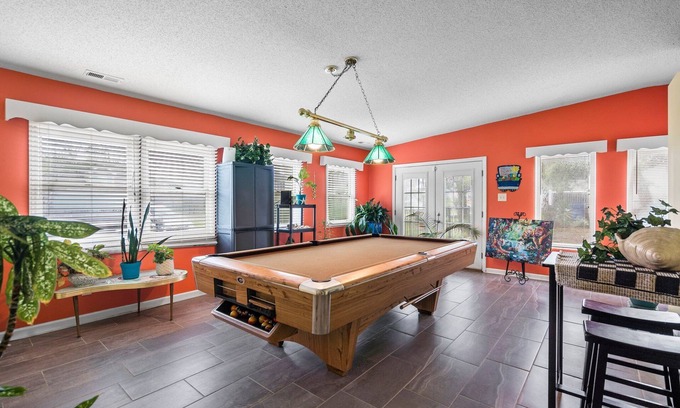 Tranquil Harbour House | The Island House is close to the beach with pool table and hot tub.