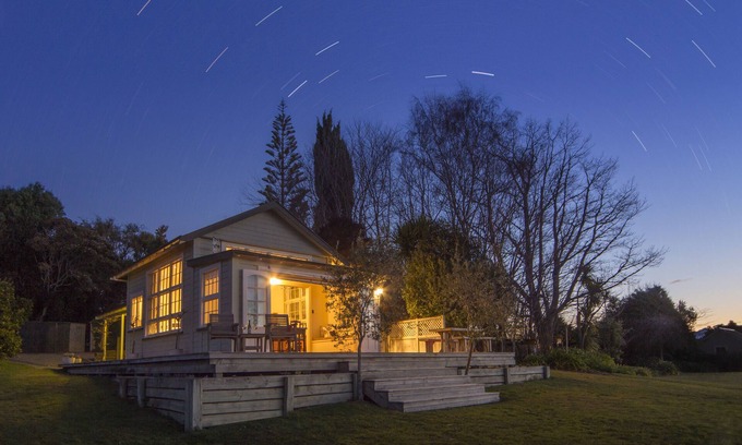 Tasman Cottage | The Old Schoolhouse - Historic Vineyard Accommodation with Stunning Sea Views