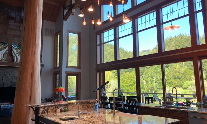 Port Orford House | THE ONLY LUXURY RIVER FRONT PROPERTY ON THE ELK RIVER. 10 min to beach & town!