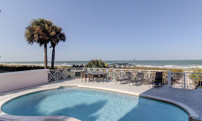 Belleair Beach House | The Pink Palace- Gulf front townhouse with private pool & large patio, sleeps 12