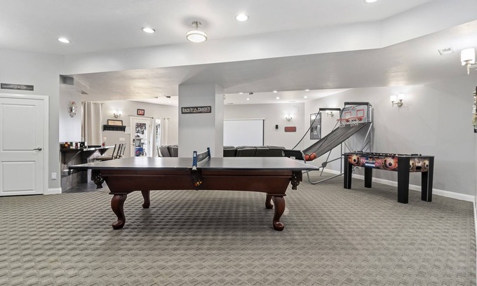North Ogden Apartment | The Rec Room is a basement apartment with game tables, theater, hot tub & more!