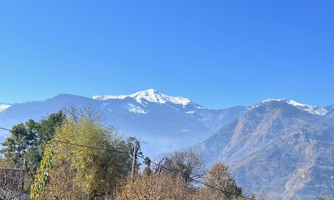Manali Cottage | The Retreat - cozy cottage nestled in apple orchard with gorgeous mountain views