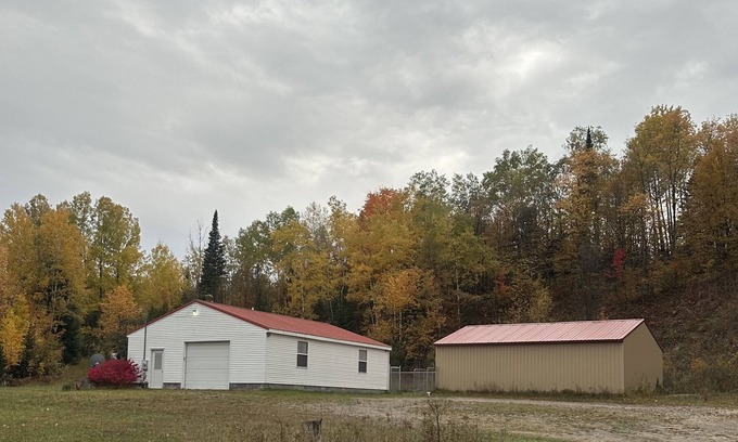 Wolverine House | The snow has arrived! Cook’s Getaway across from Snowmobile Trails
