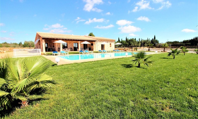 Son Antem House | They are Pieres Nou. modern rustic finca with volley ball court and 15m pool
