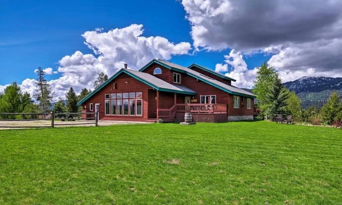 Tamarack Resort Apartment | This private riverfront escape near McCall sleeps 22+! Bar/game room, huge kitchen/dining. Between Tamarack & Brundage, with ride-out snowmobile trail access. Cozy fireplace & big TVs for sports fans.