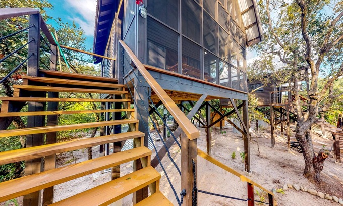 Surfside Cabin | Three forest cabanas with verandas, hammocks, WiFi & partial AC - walk to beach
