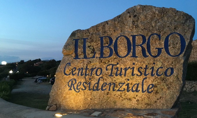 Porto Pollo Apartment | Three-room apartment with large sea view terrace, garden & barbecue.