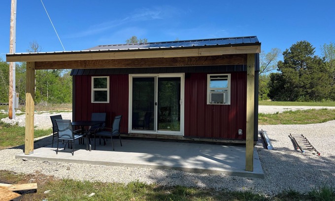 Monroe City Cabin | Tiny cabin set in back of the property. Great for a quiet couples getaway.