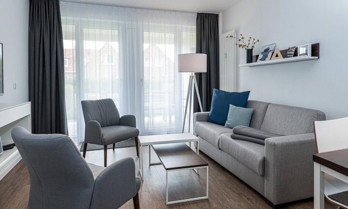 Bensersiel Apartment | Top-ferienapartment mit Großer Terrasse, Parkplatz, Schwimmbad- & Saunanutzung
