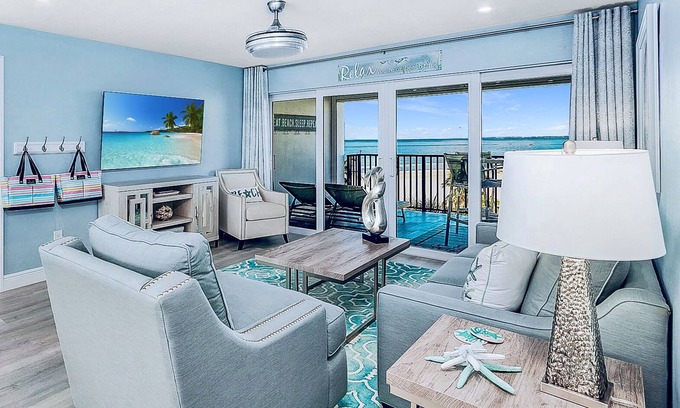 Fort Myers Beach Condo | Top Floor Beachfront & Sunset Views! Renovated! WIFI, Smart TV's + Work Space!