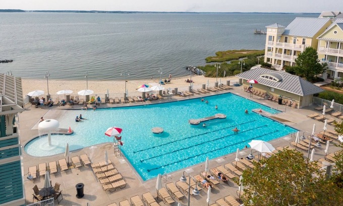 Sunset Island Condo | Top Floor w/water views, Free Linens & Towels! 2 POOLS, Beach Chairs/Beach Cart!