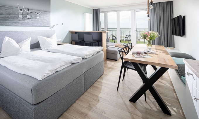 Norderney Apartment | Top sea view, one-room apartment, modern, directly on the beach with sauna and WLAN