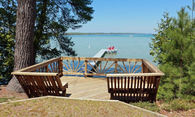 Rapid City House | Torch Lake Sandbar Waterfront Home - with Dock!