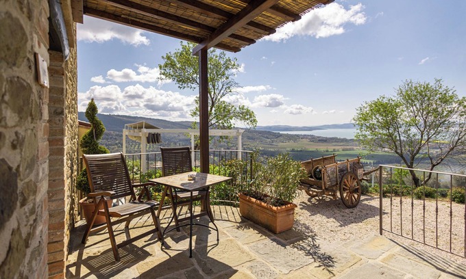 Passignano sul Trasimeno Apartment | Tower- Room with patio with beautiful lake view