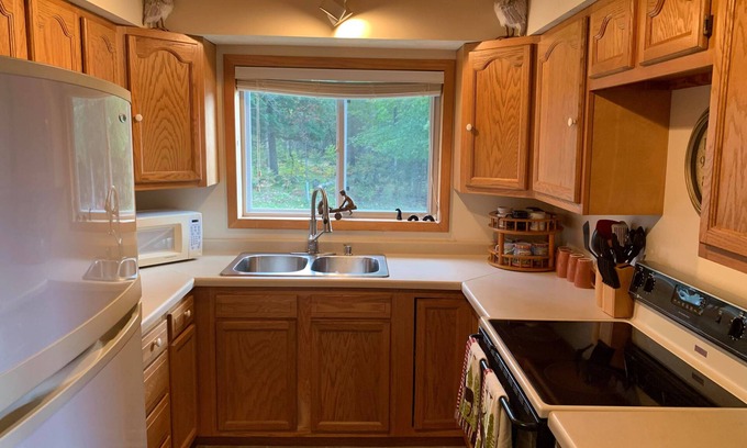 Cornell Cottage | Tranquil Escanaba River front cottage, newly renovated, great fishing!