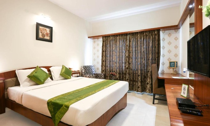 Mysore Hotel | Treebo Premium Akshaya Mahal Inn