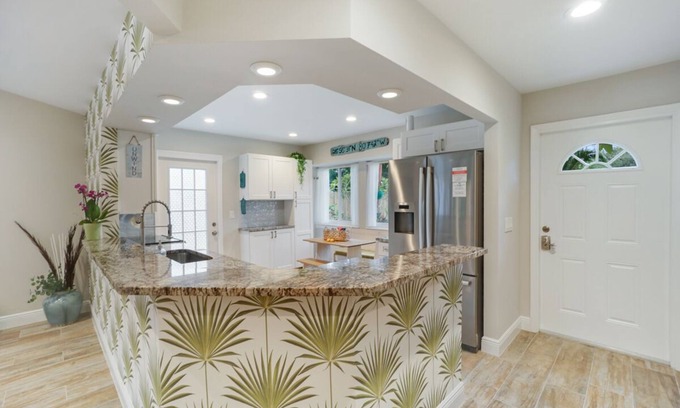 Jupiter Landing House | Tropical Getaway: Welcoming Home, Big Backyard