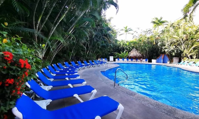 Fluvial Vallarta Apartment | Tropical Lush Gardens, Great Pools & Location