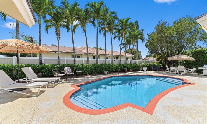 Margate House | Tropical Oasis Escape with Heated Pool & BBQ