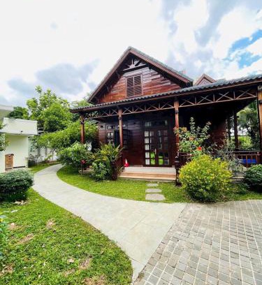 District 9 Villa | Tropical Riverfront Pool House