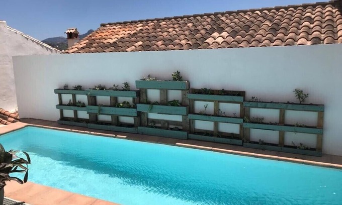 Algodonales House | Two big houses with pool nestled into foot of the mountain