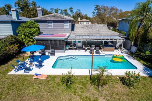 Seminole Villa | Ultimate Beach Getaway · Mins from Beach · Hot Tub · Heated Pool · Game Room