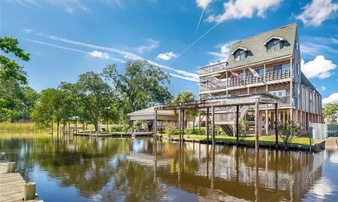 Slidell House | Unique Bayou Waterfront Whimsical home in family neighbor