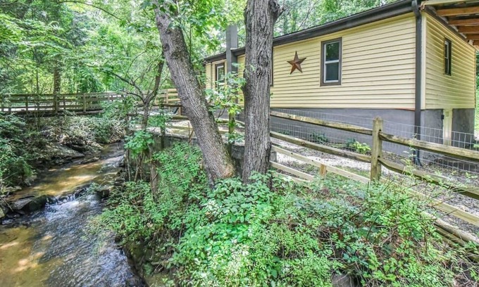 Alexander House | Unique creekside property with hot tub and fire pit