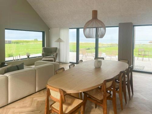 Vejlby Fed House | Unique Holiday Home Directly On The Beach