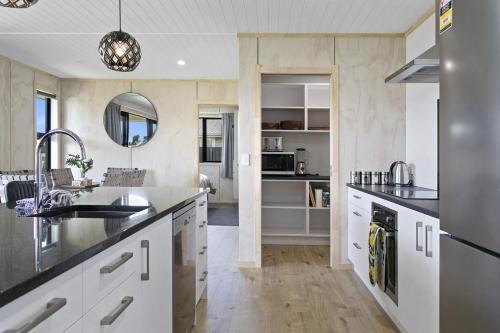 Wharewaka House | Unwind on Wai, New 4BR Home With Style and Comfort