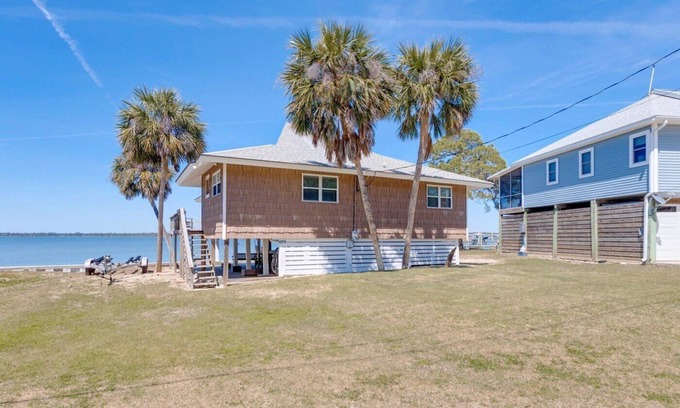 Alligator Point House | Updated Alligator Point bay front home with dock. Great water and sunset views!