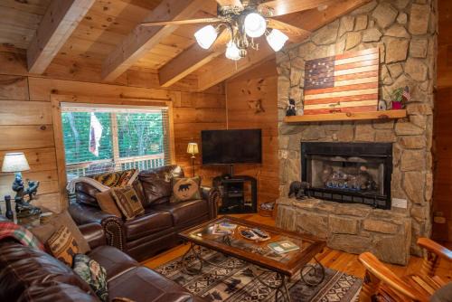 Fleetwood House | Updated Cabin with 2 primary suites, hot tub, spacious covered porch