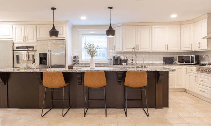 Charlotte House | Updated home with chef's kitchen, open floorplan, and large yard
