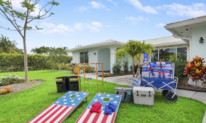 Beau Rivage West House | Updated Stuart home in waterfront community with private backyard, pool & lanai