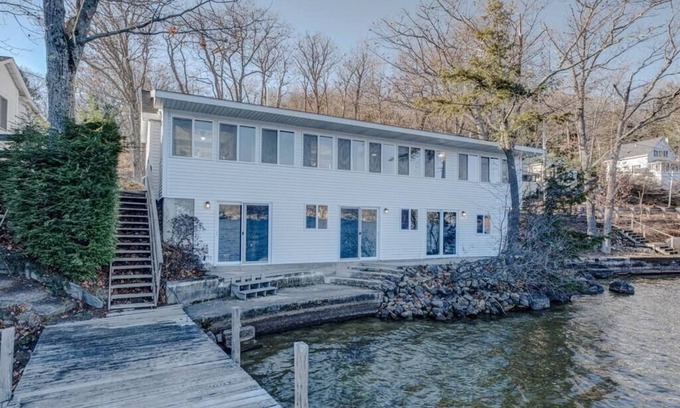Alton Bay House | Vacanza Sleeps 12 with 3 individual units and 3 Docks steps from the Lake