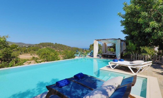 Sant Agusti des Vedra House | Vacation Home "Casa Ibicenca Can Chinchó" with Mountain View, Private Pool & Wi-Fi