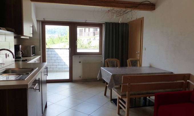 Rifiano Apartment | Vacation apartment for 2-4 people with southwest-facing loggia and organic natural bathing pond