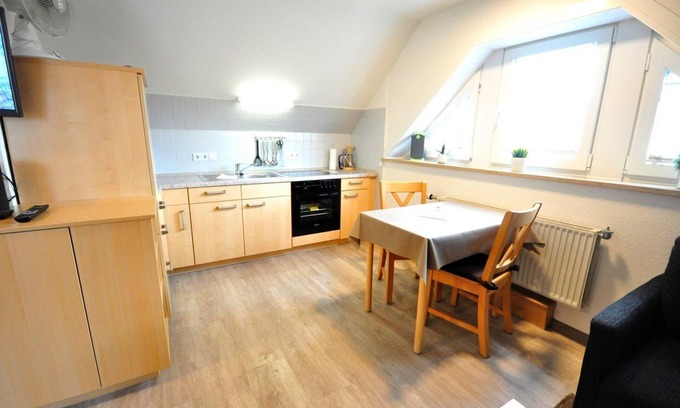 Neuharlingersiel Apartment | Vacation apartment Wangerooge Deichringstr. 10 Whg. 9 - House Südereck