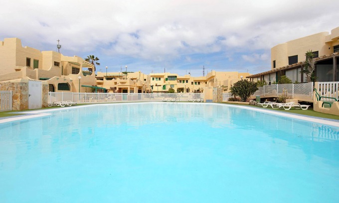 Bahia Calma Apartment | Vacation Apartment 'Casa Relax' with Shared Pool, Private Terrace and Wi-Fi