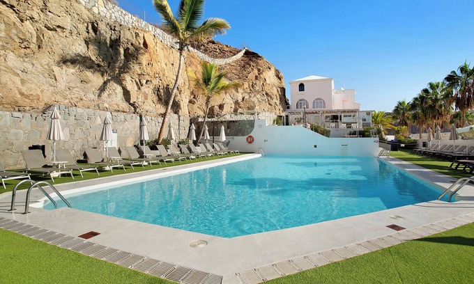 Puerto Rico Apartment | Vacation Apartment 'Dreams' with Sea View, Shared Pool and Wi-Fi