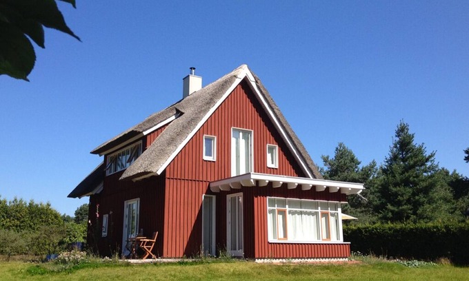 Pruchten Apartment | Vacation apartment in a thatched wooden house - very quiet and idyllic location