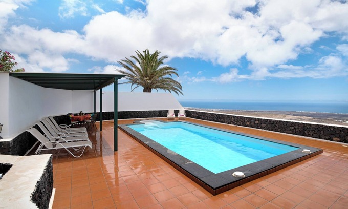 Tias Apartment | Vacation Apartment “La Vega de Lanzarote 3” with Sea View, Pool & Wi-Fi