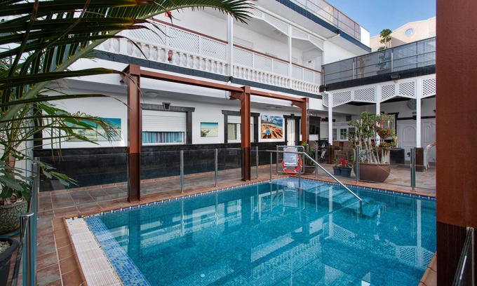Playa de Arinaga Apartment | Vacation 'Casa Paula - 24' with Mountain View, Private Pool and Wi-Fi