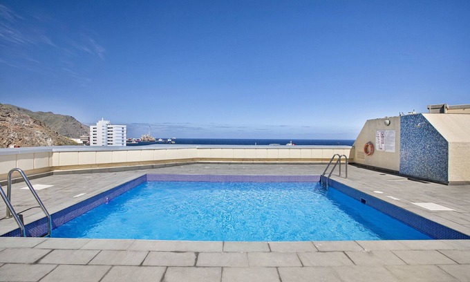 Santa Cruz de Tenerife Apartment | Vacation Apartment 'Sovhispan' with Sea View, Shared Pool and Wi-Fi