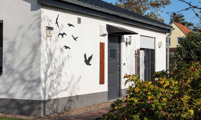 Dorumer Neufeld House | Vacation home Möwennest. With sun terrace and at ground level.