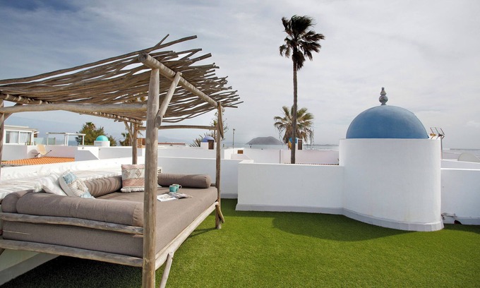 Corralejo House | Vacation Home 'Belle' with Sea View, Shared Pool and Private Terrace