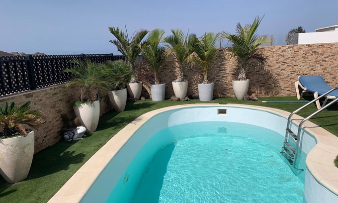 Geafond House | Vacation Home 'Corralejo Branded Residensed' with Sea View, Wi-Fi and Air Conditioning